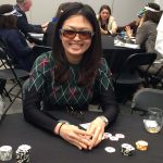 Poker Divas - A woman hides cards