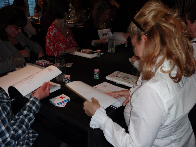 Poker Divas - Women reading instruction